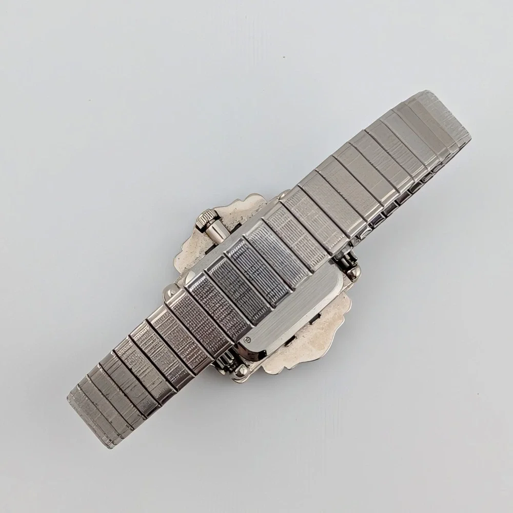 Avon silver tone